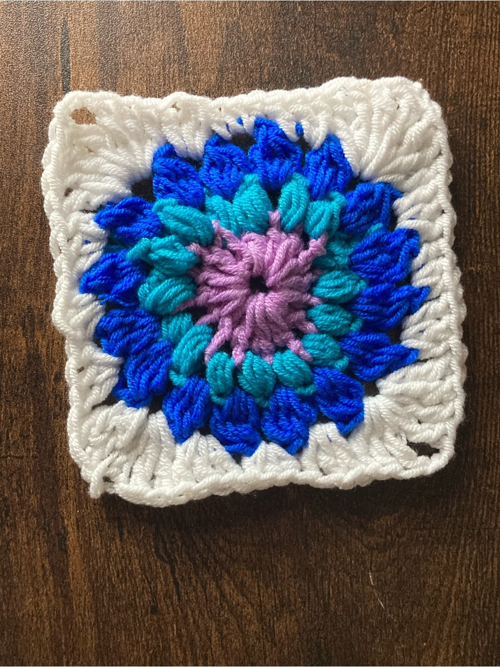 Handmade Crochet Square with White Border and Blue, Teal & Purple Flower